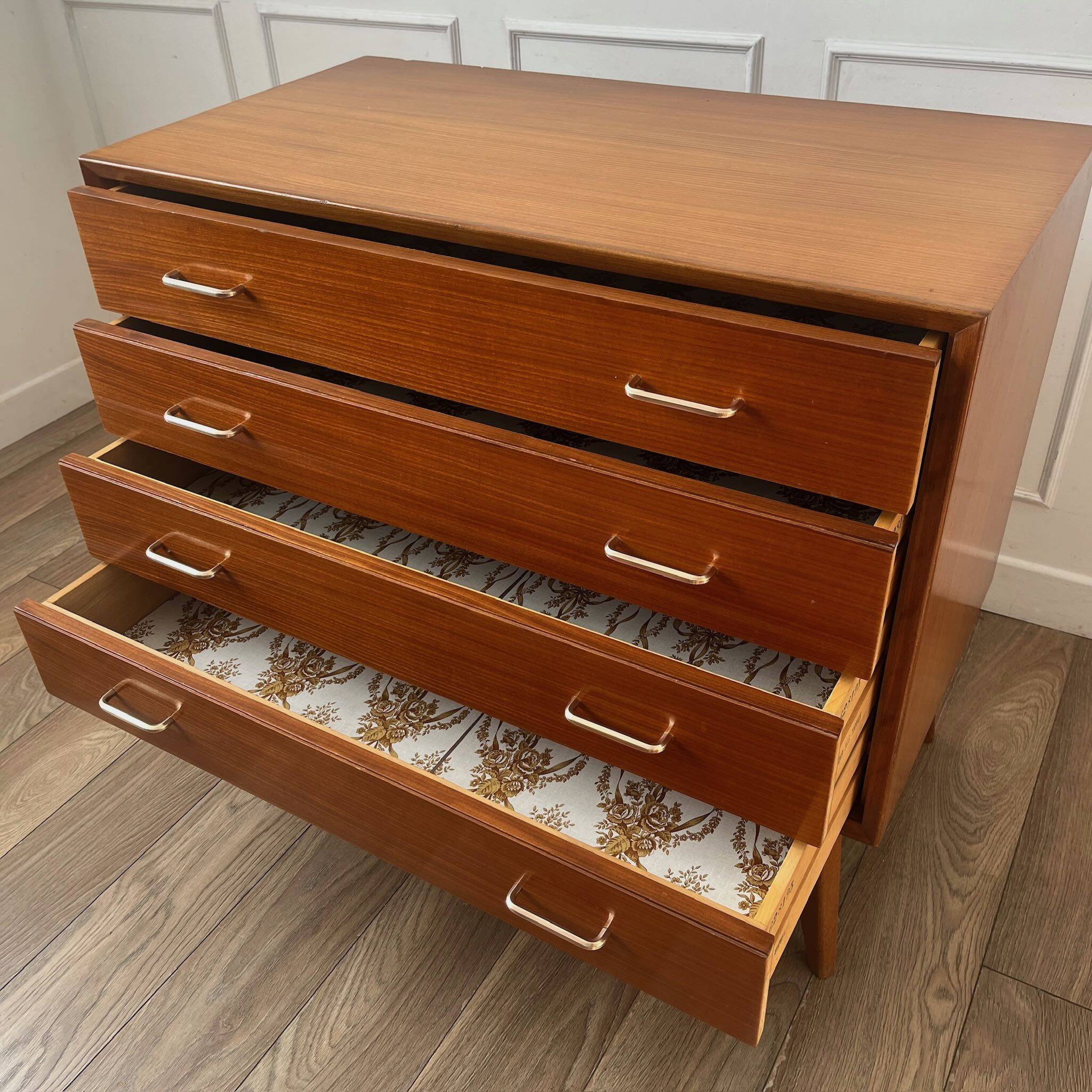 Vintage chest of drawers with compass feet