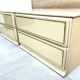 Pair of bedside tables with 2 drawers, glossy cream and gold, 1980.