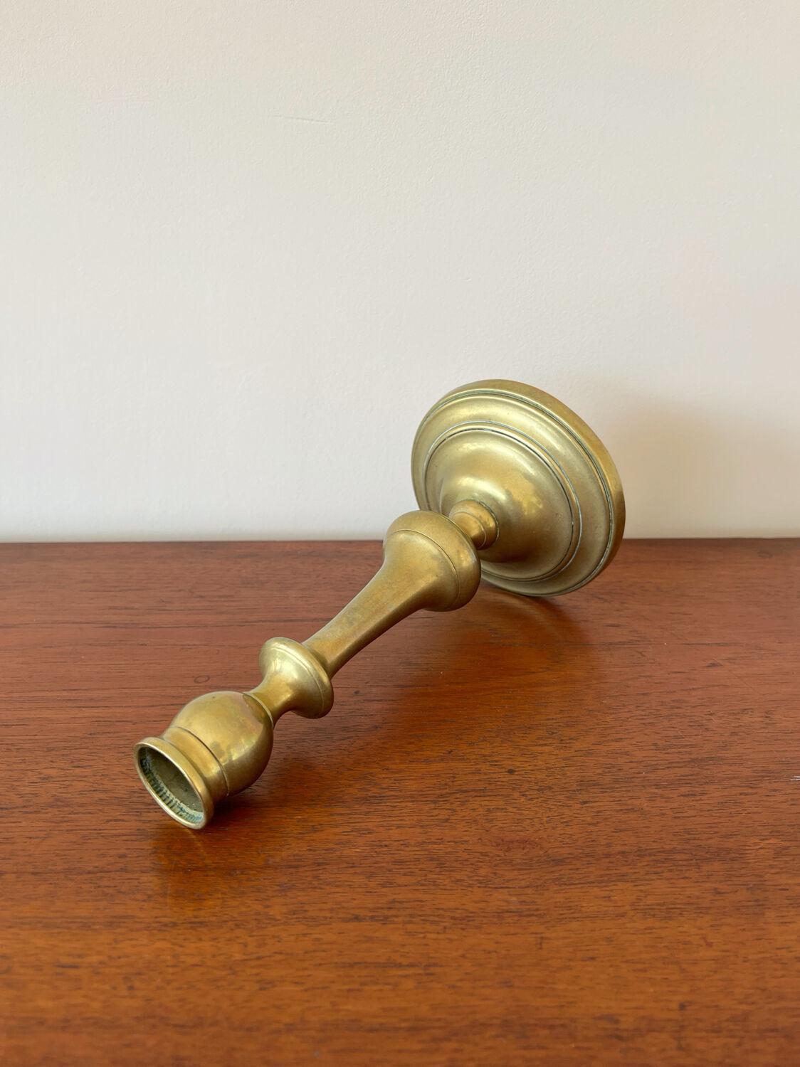 Vintage baluster-shaped antique brass candlestick