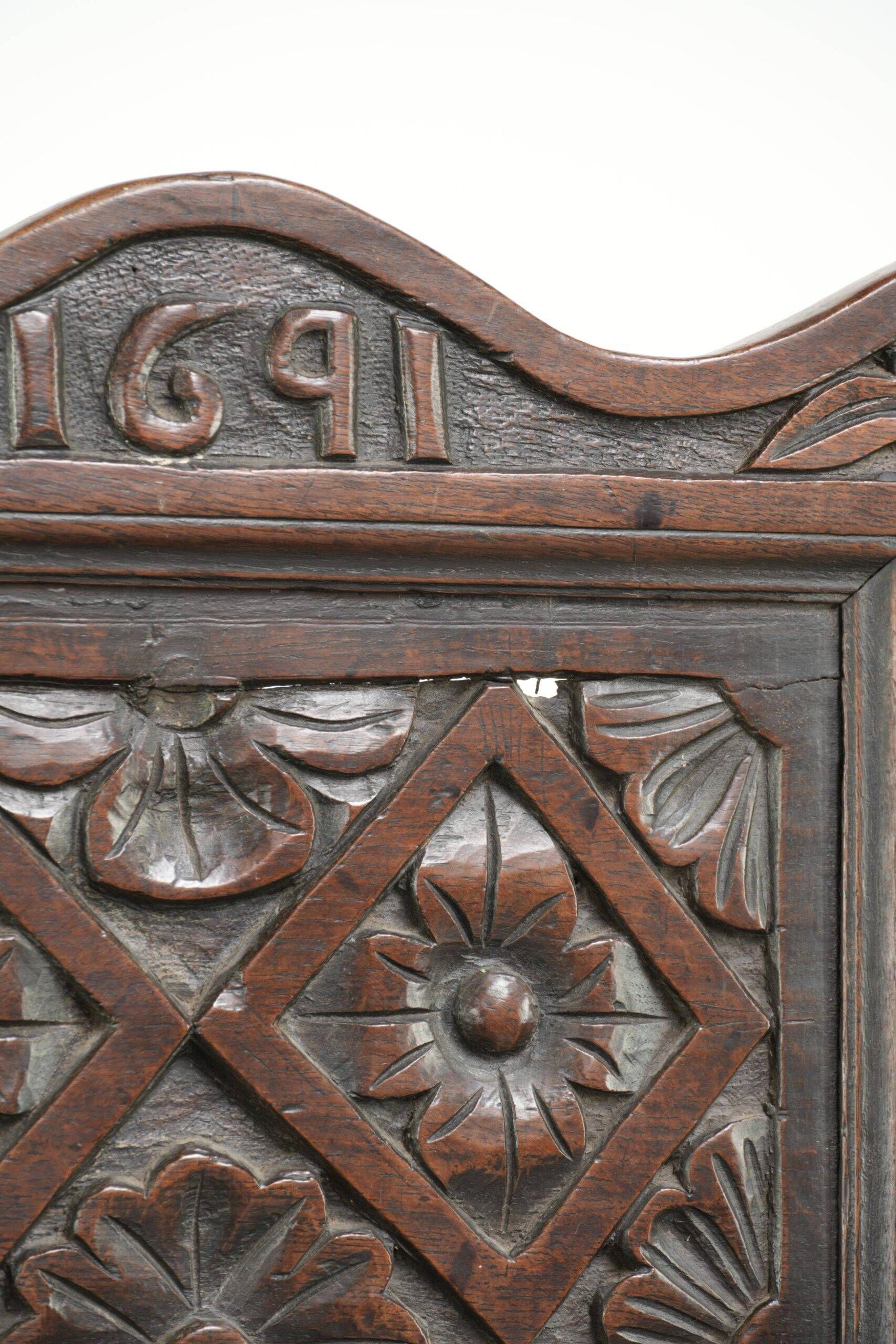 Unique 18th-century English oak wainscot chair with amazing woodcarving