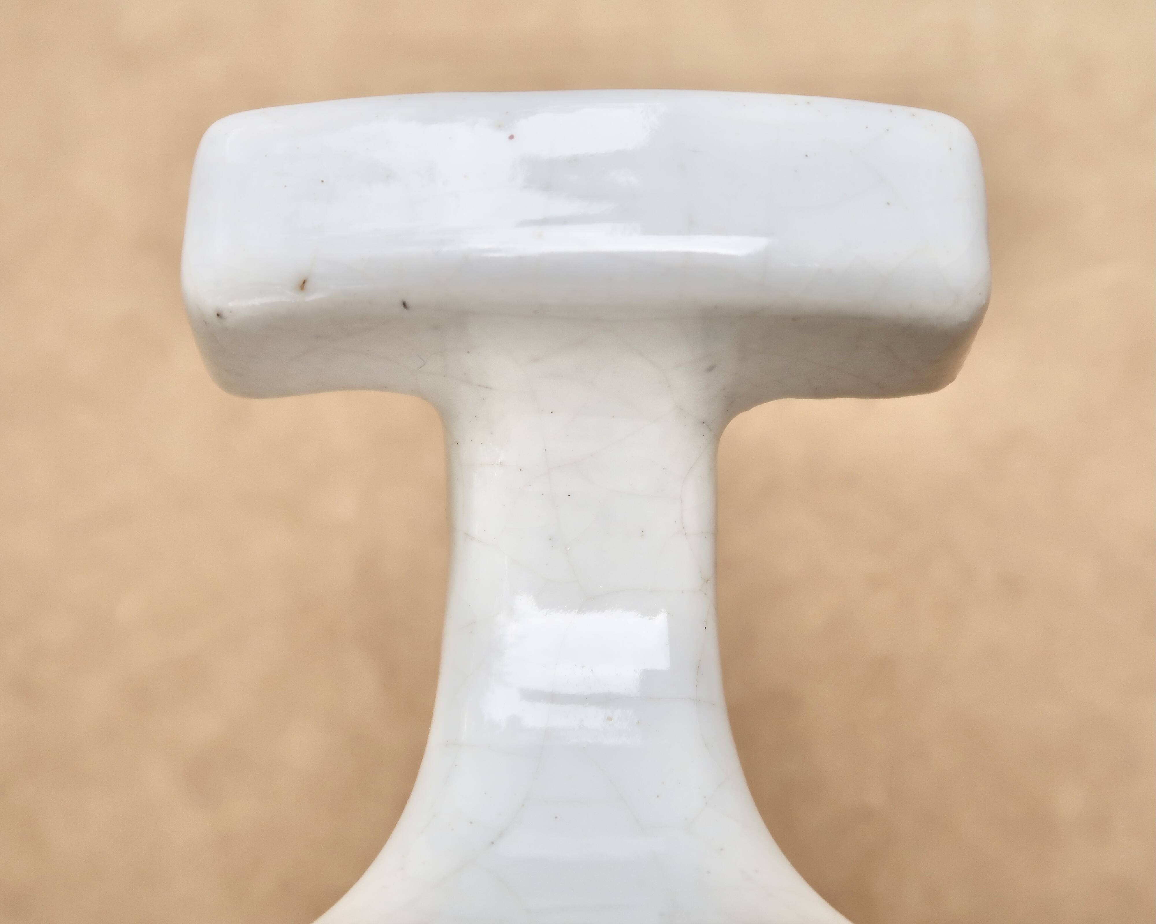 White porcelain coat hooks, 1950s
