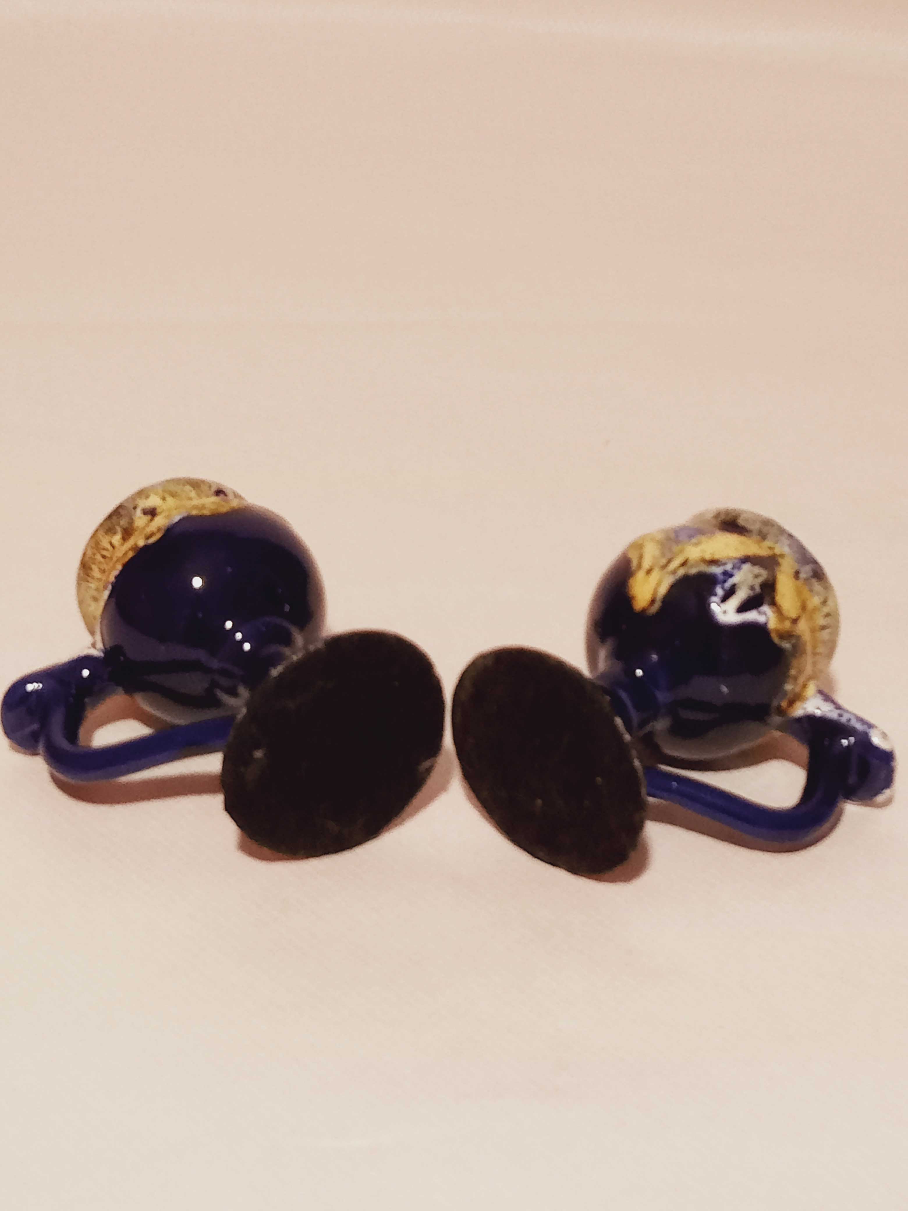 Pair of ceramic candle holders