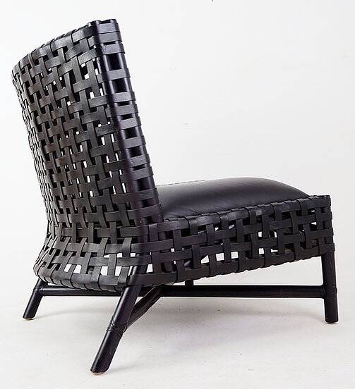 Pair of black woven leather lounge chairs