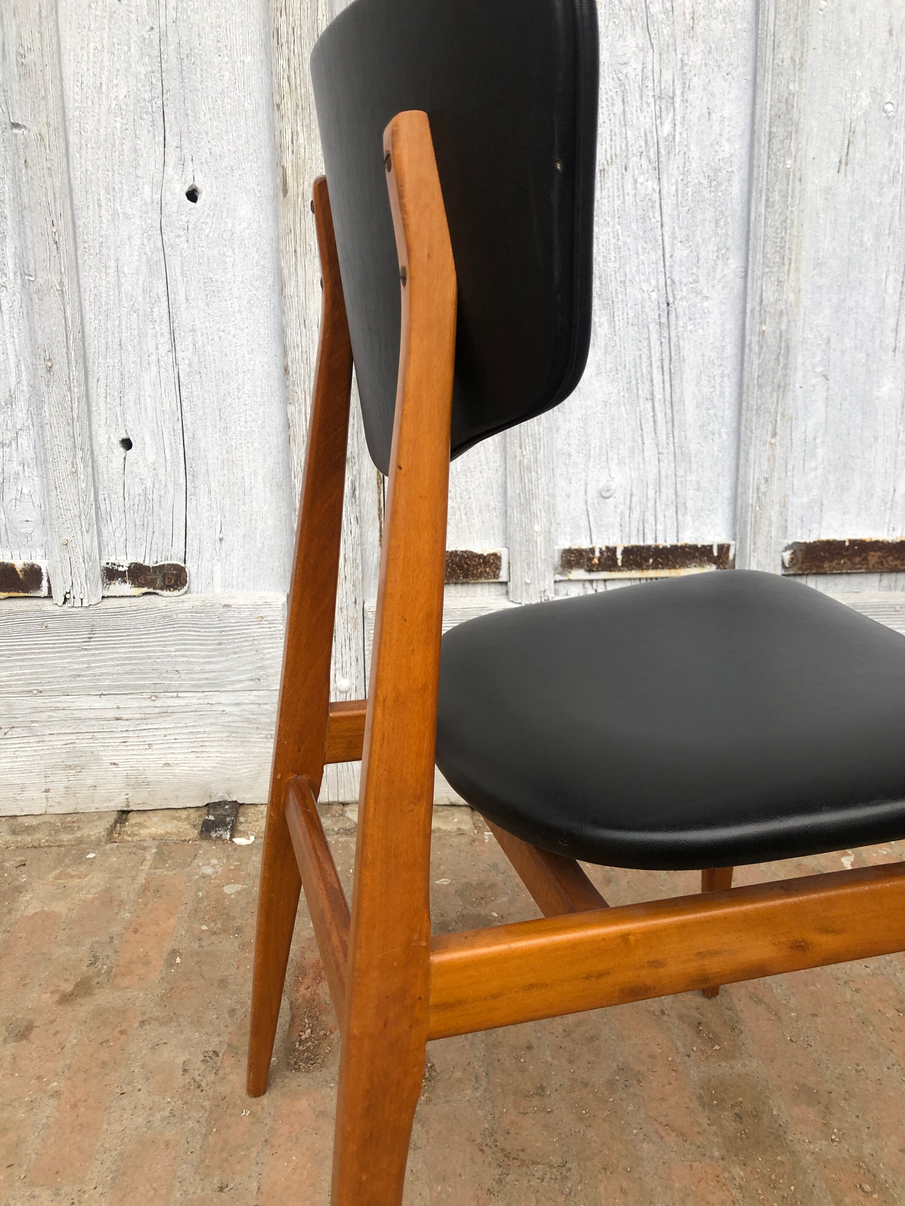 Set of 4 Scandinavian teak and black skai chairs