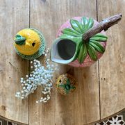 Set of ceramic fruits, a strawberry decanter and two lemon and pineapple jam jars