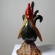 Small decorative rooster in handcrafted enameled ceramic folk art