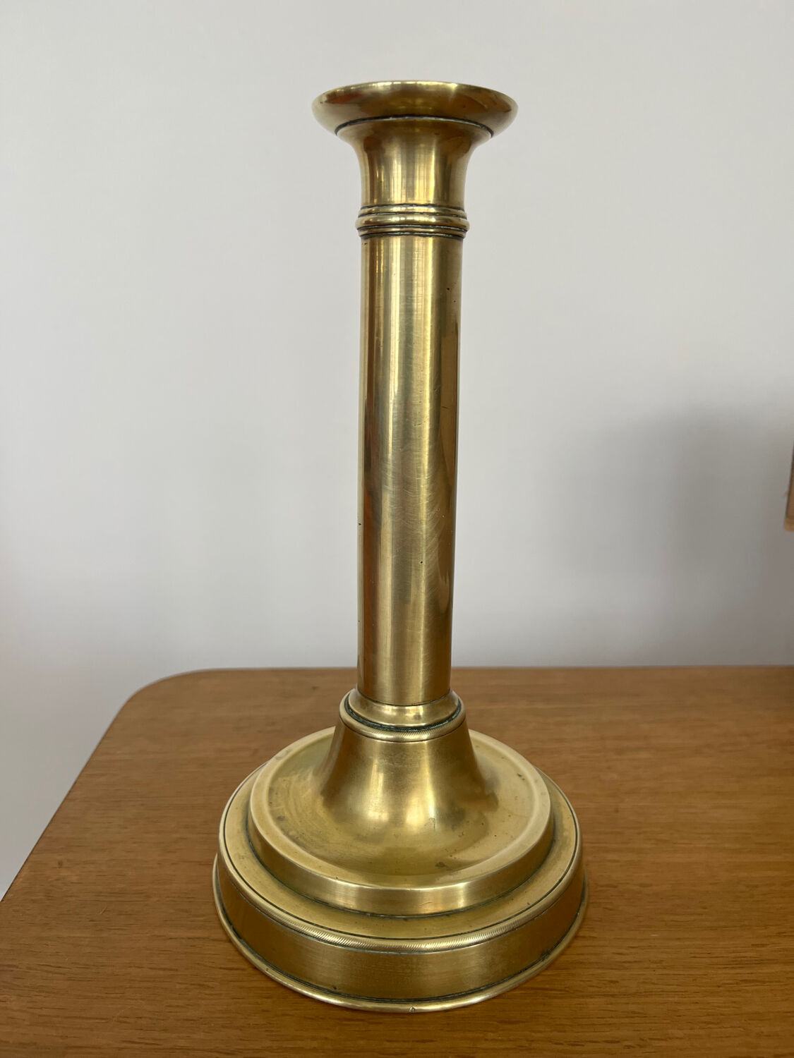 Antique brass push candle holder