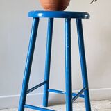 Vintage wooden stool with electric blue paint