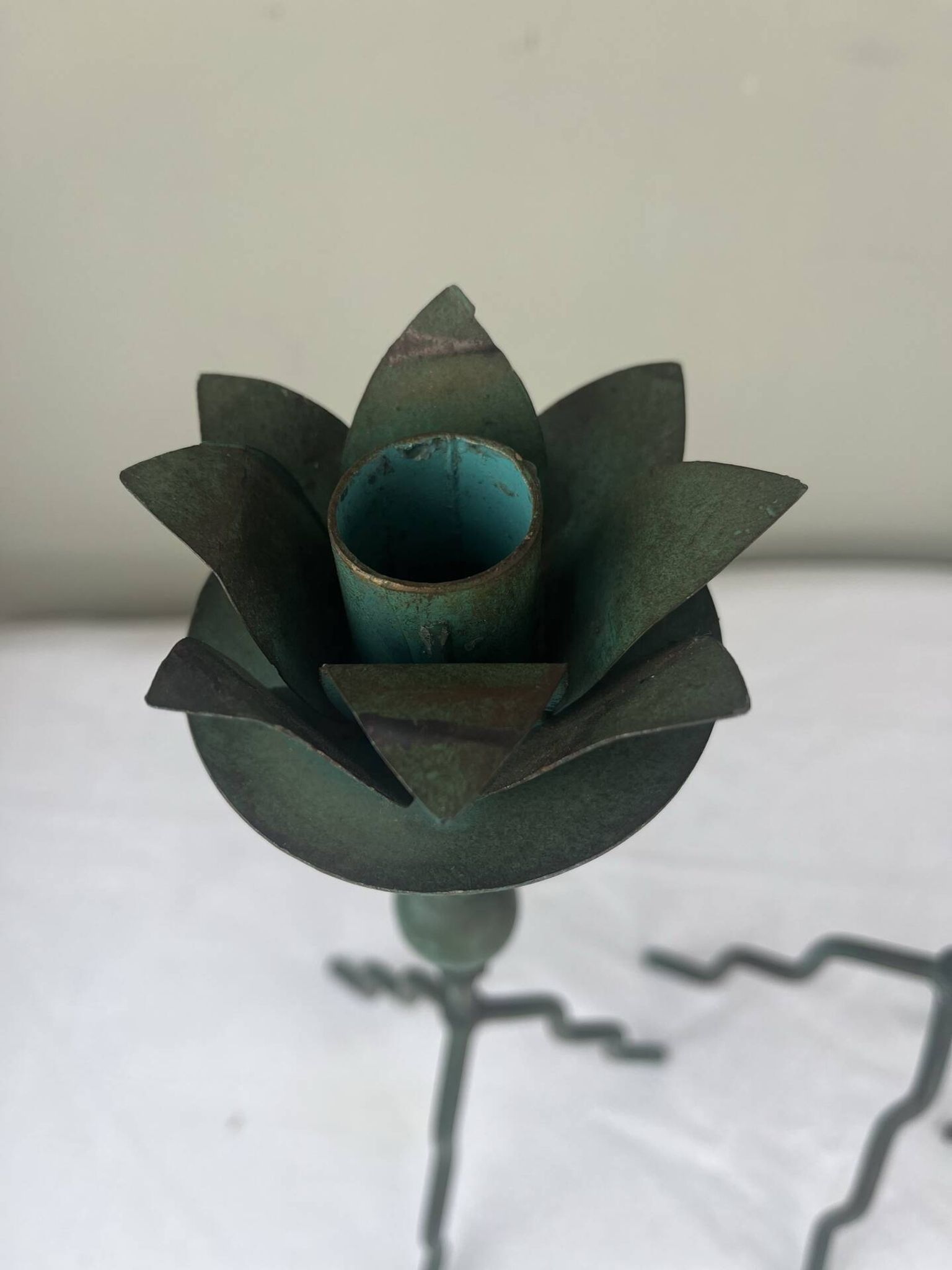 Sculptural candle holder trio