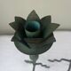 Sculptural candle holder trio