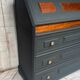 Wooden and black secretary desk
