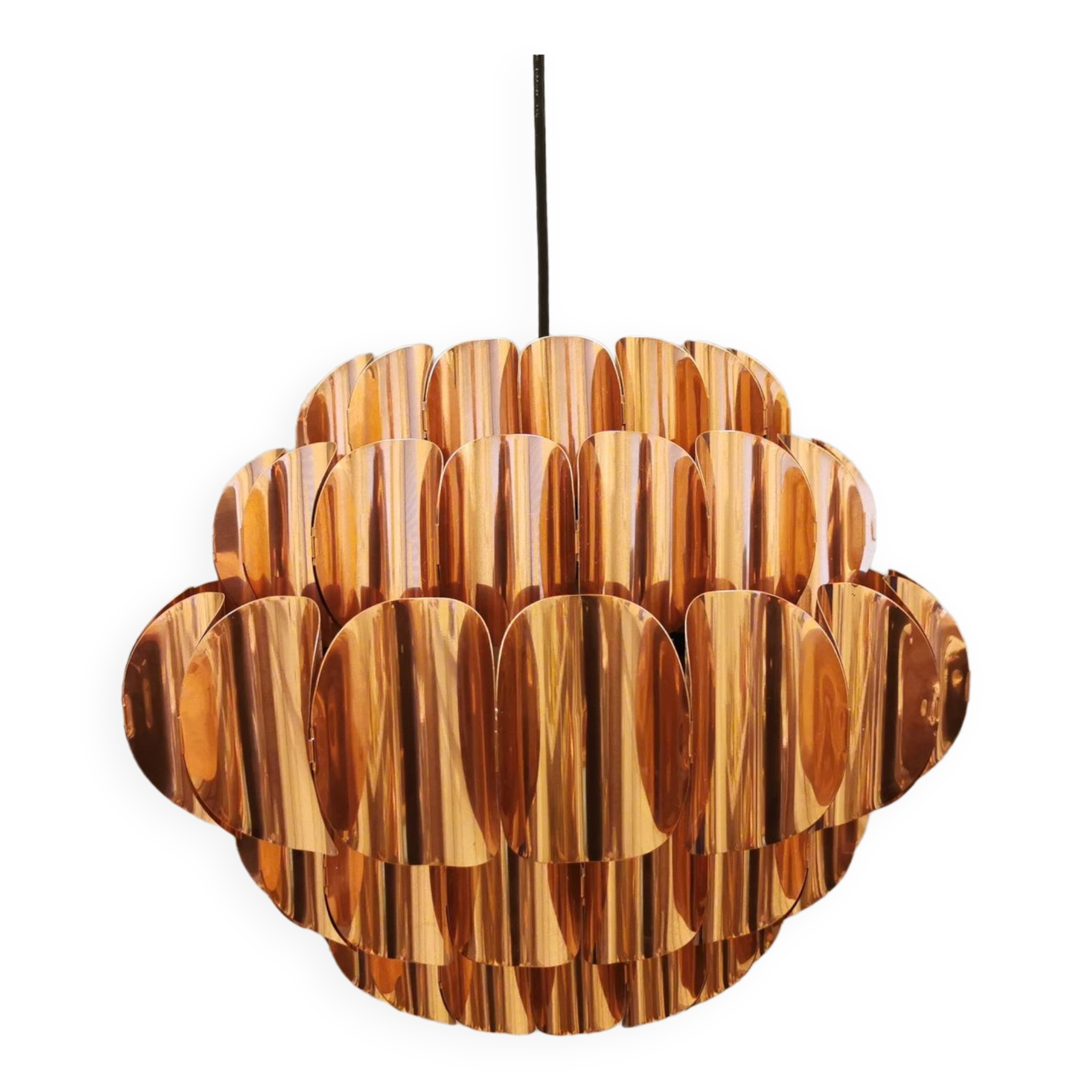 Copper colored hanging lamp. designed by thorsten orrling sweden