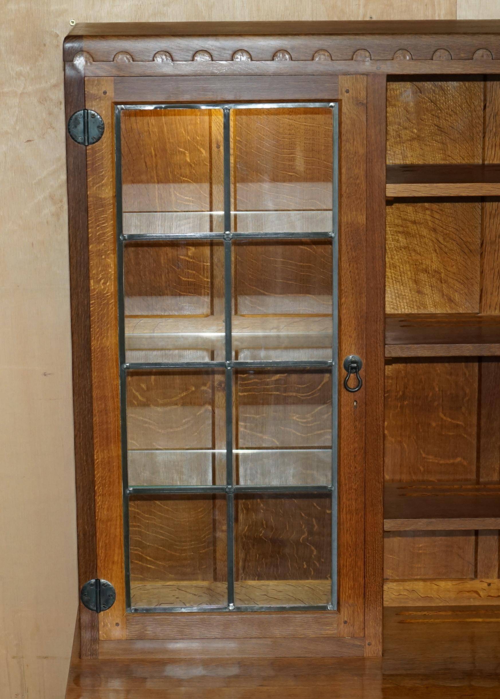 Vintage Robert Mouseman Thompson oak display cabinet with shelves and lighting.