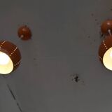 Pair of 70's globes in orange lacquered metal.