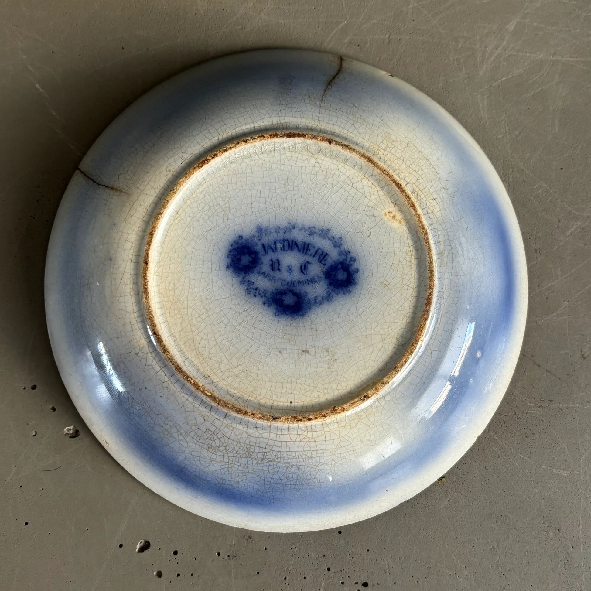 Stack of Sarreguemines plates, jardinière model.