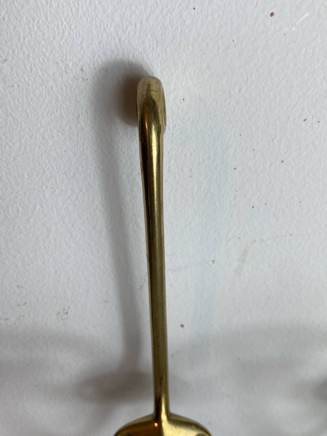 Pair of brass hooks