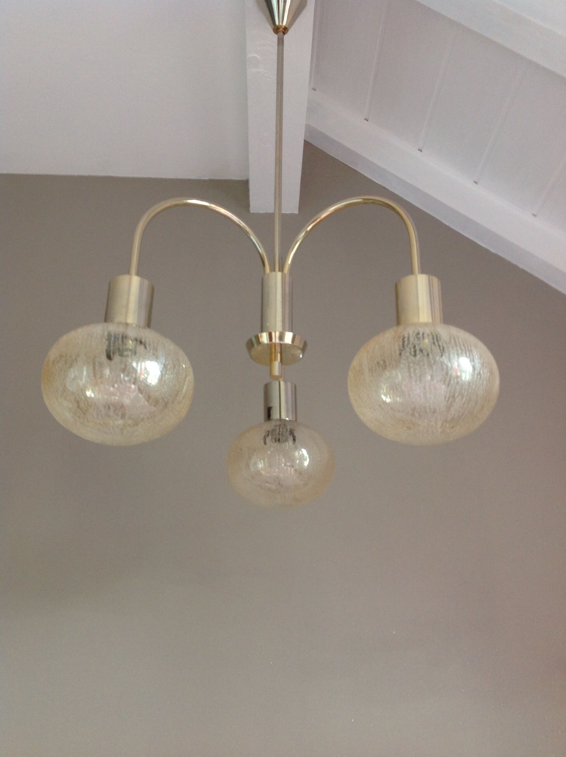 Three-globe brass chandelier in amber/vintage glass 60s-70s