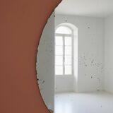 Large vintage chiseled round mirror