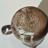 Stoneware pitcher signed by Jacques Pouchain.