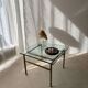 Swedish brass coffee table with a marbled glass top from the 1960s.