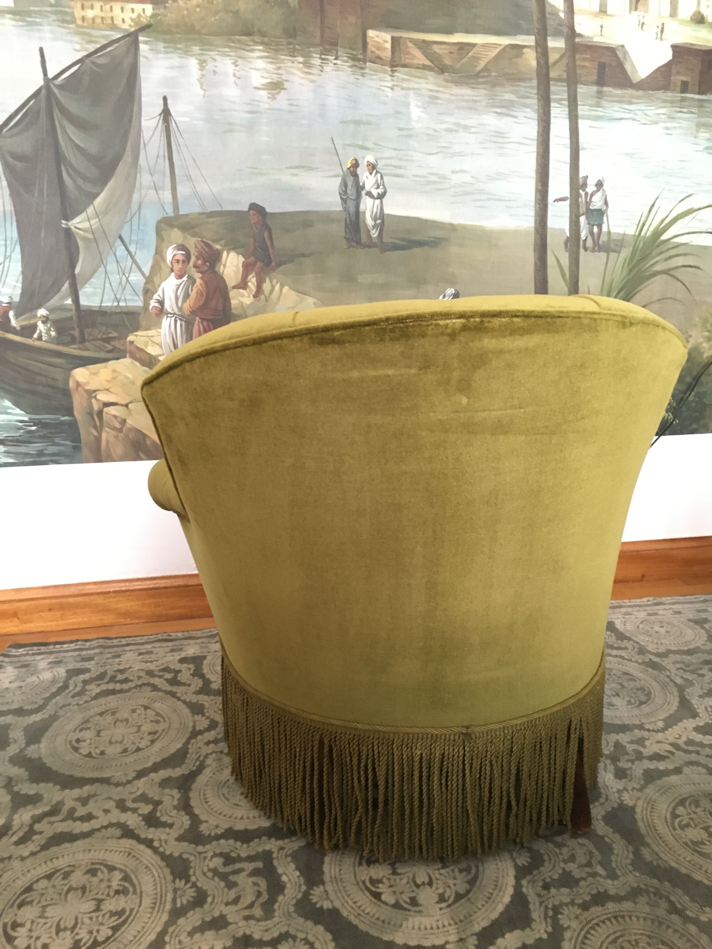 Old chair padded green velvet