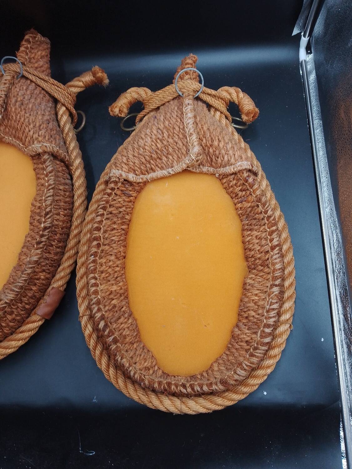 Pair of large oval rope and leather mirrors, very good condition, 1950s