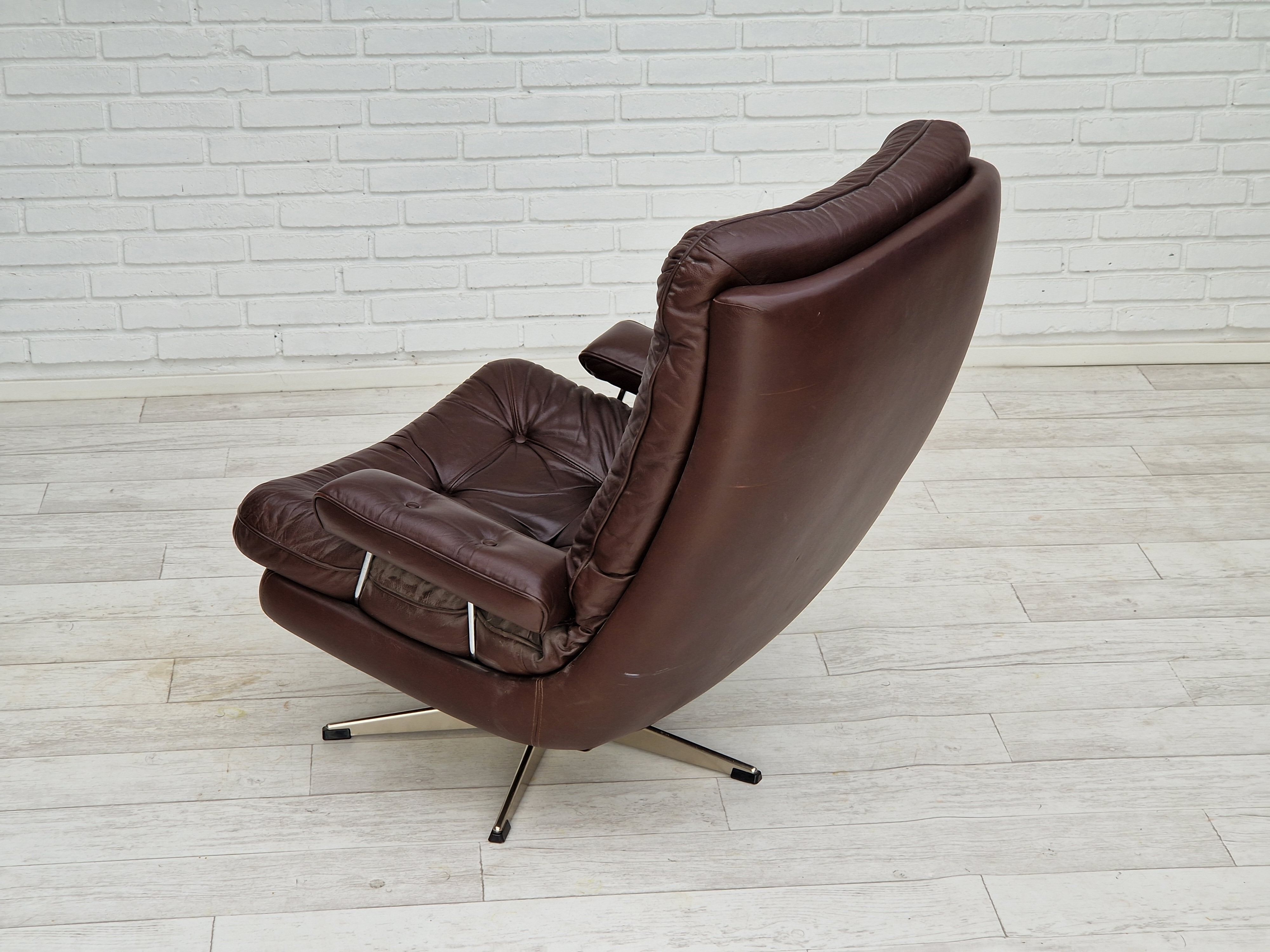 Vintage danish swivel leather armchair 1970s