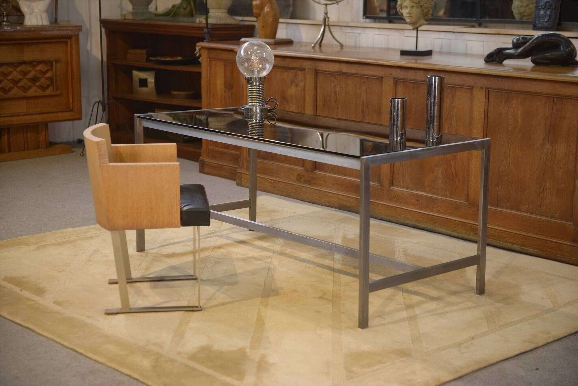 Brushed stainless steel and smoked black glass desk from the 1980s.