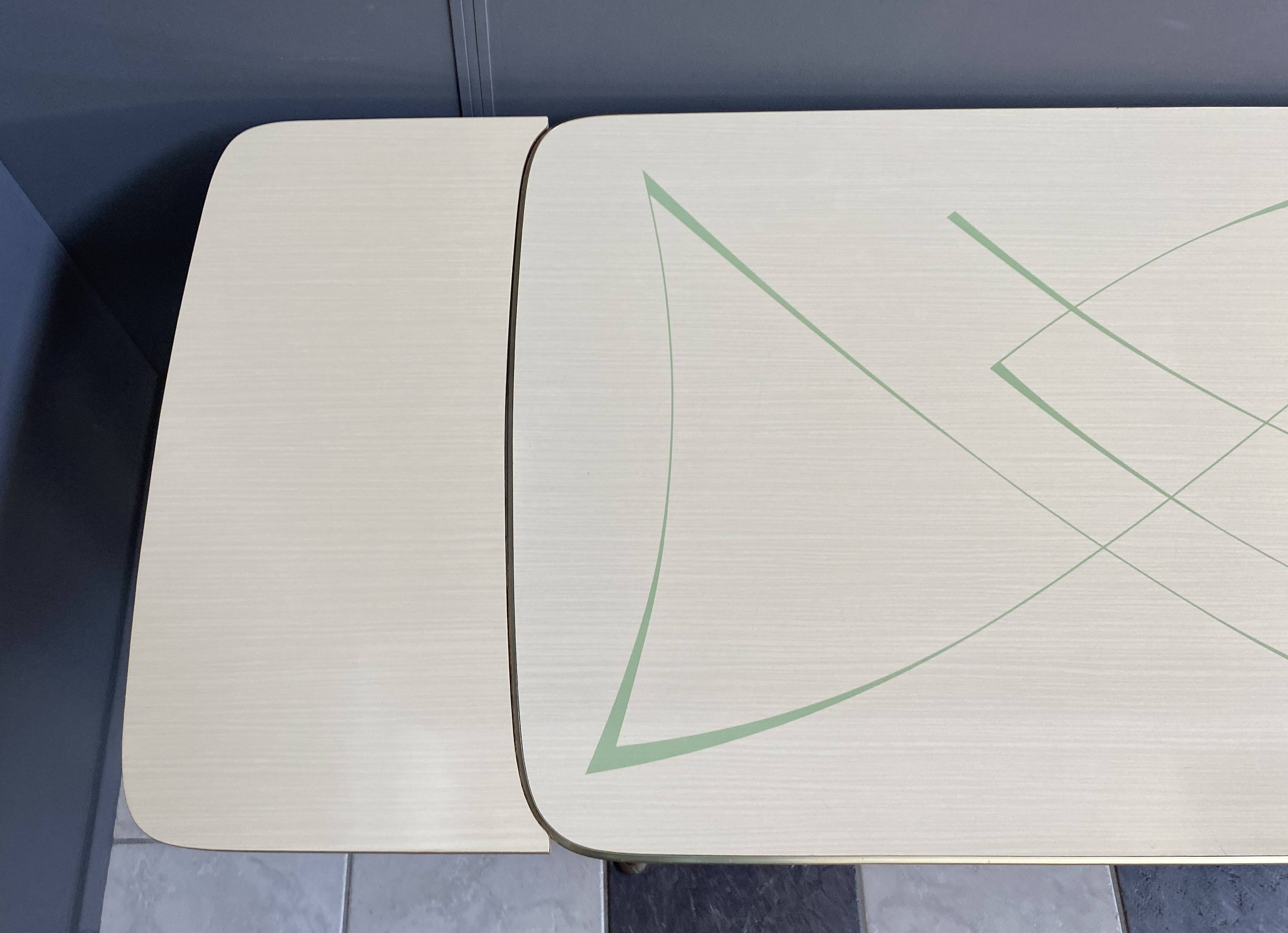 cream and green color 1960s formica dining table enlarge and changing in height