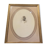Portrait drawing of a child signed Feoers