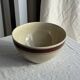 Large speckled beige salad bowl with ochre trim H14 D25