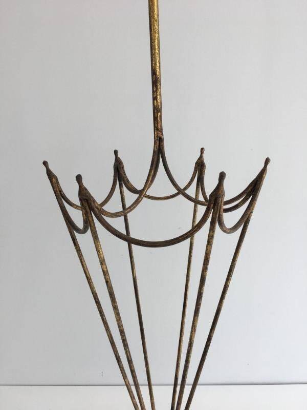 Porte-parapluie en fer forgé doré