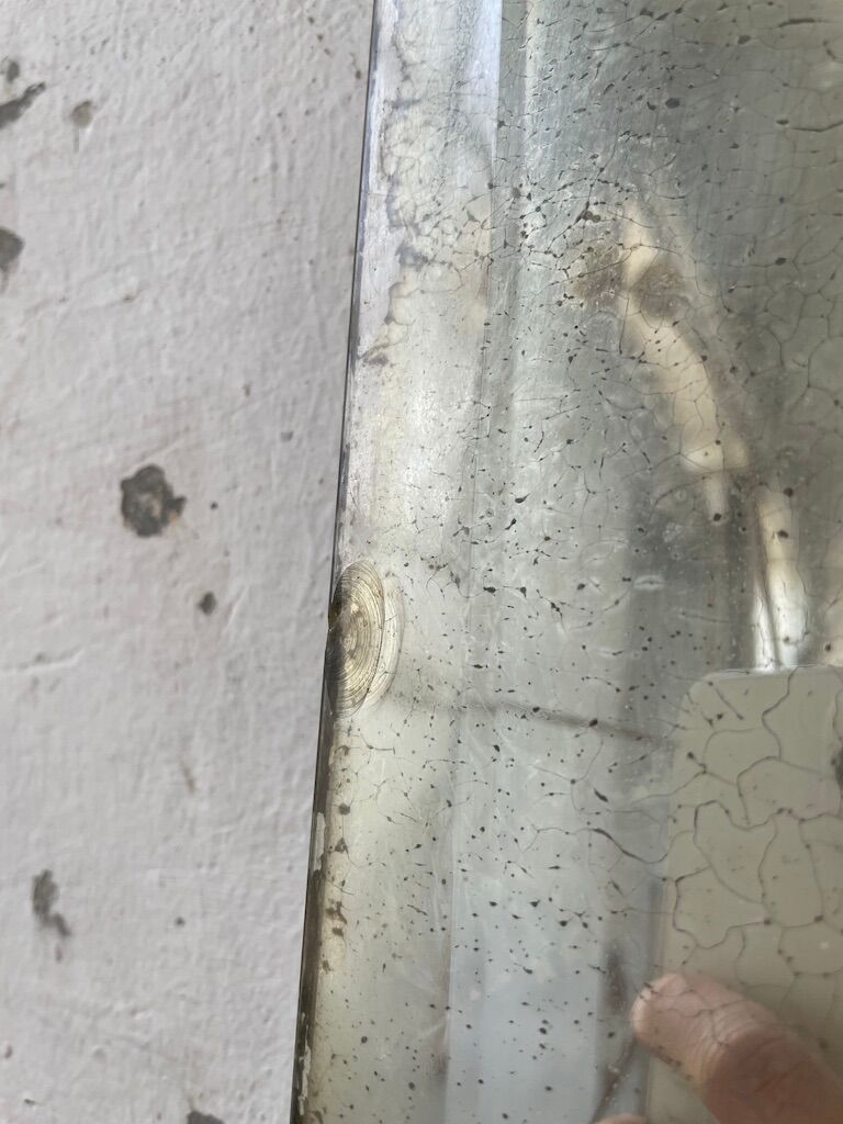 Very stung old bevelled mirror 39x60cm