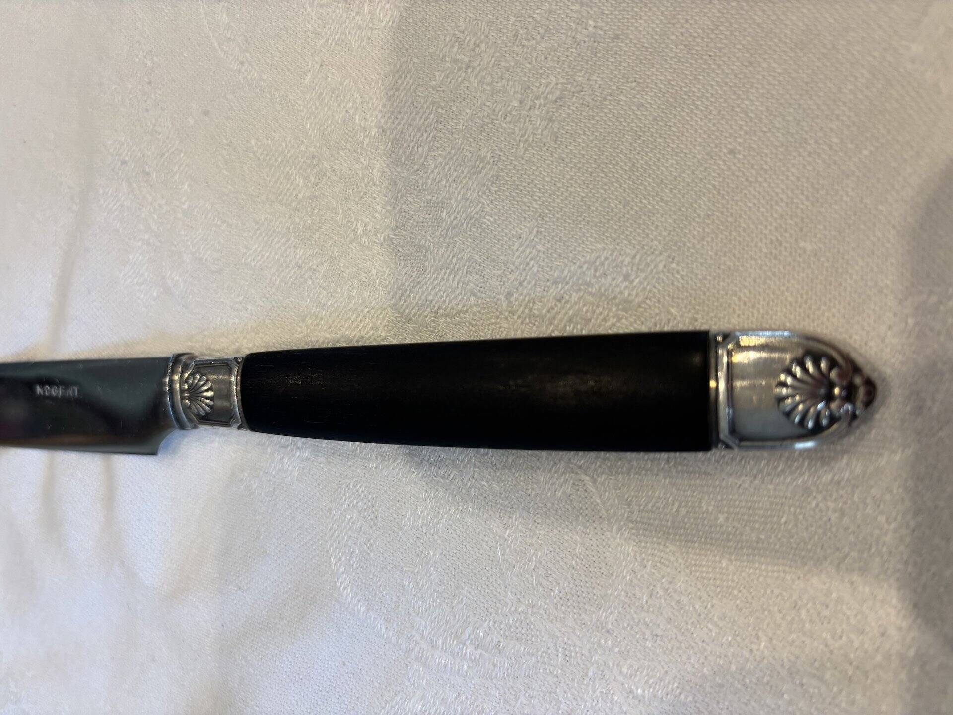 Empire-style knife set in ebony, with silver ferrules and pommels