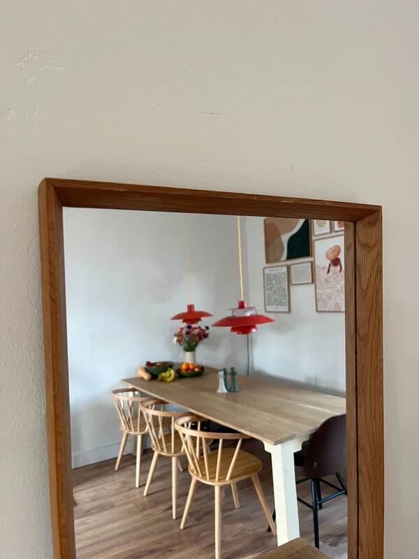 Vintage Danish oak mirror with bevelled edges.