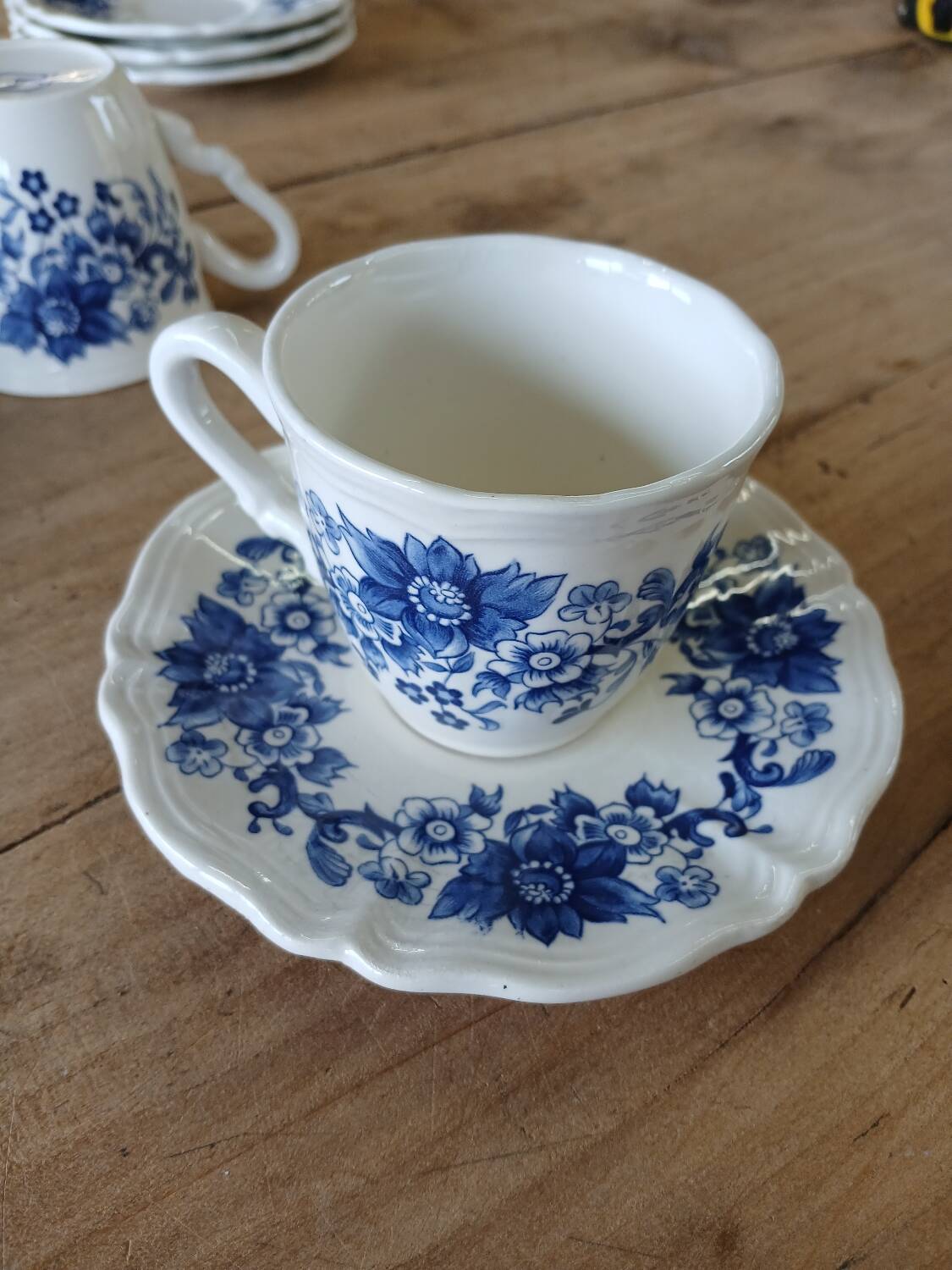 4 antique cups and saucers