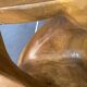 Stool no. 1 in solid raw walnut wood, carved from the mass, 1970.