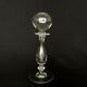 Glass oil lamp blows on foot shower