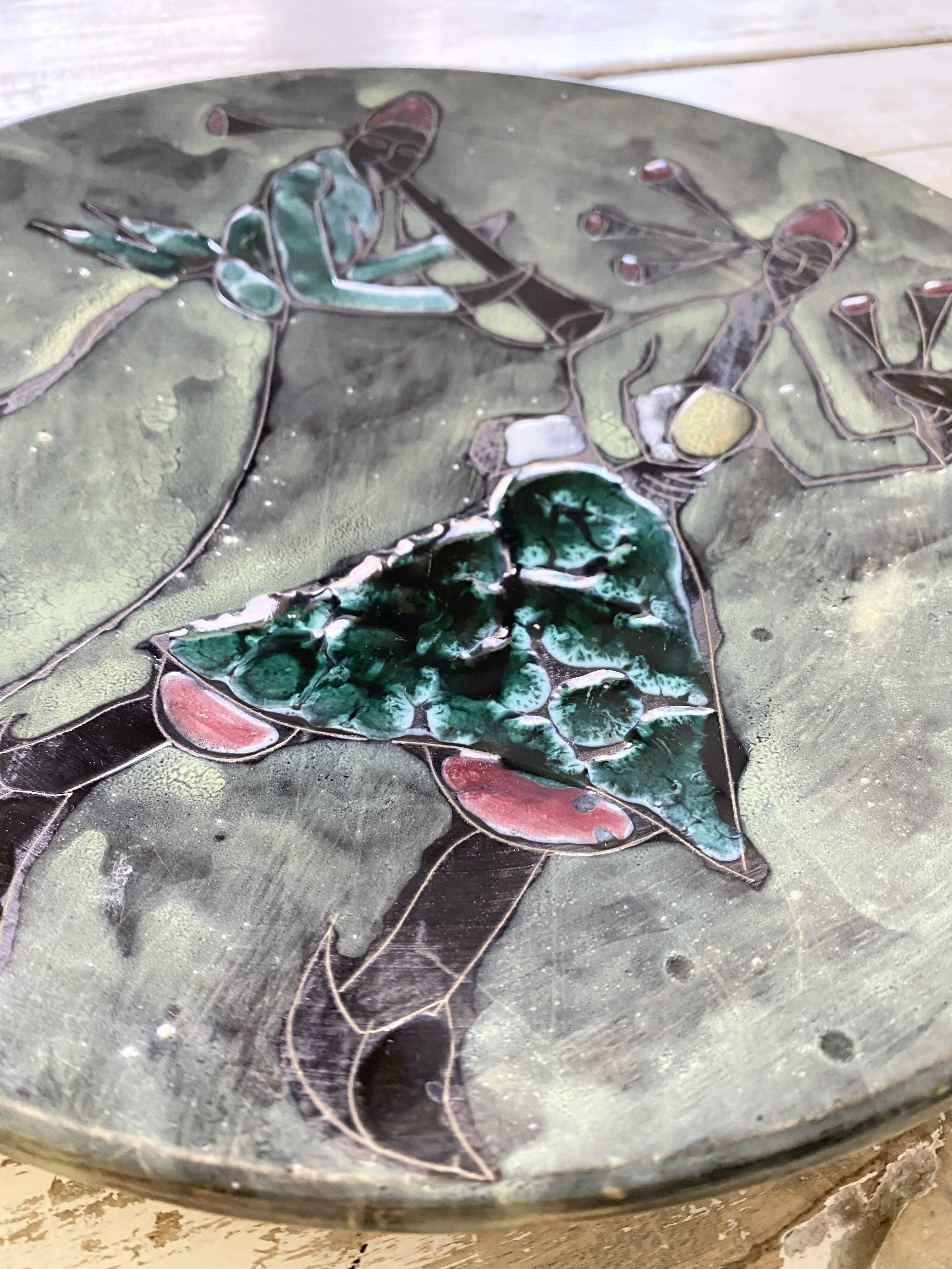 Musicians ceramic dish, signed