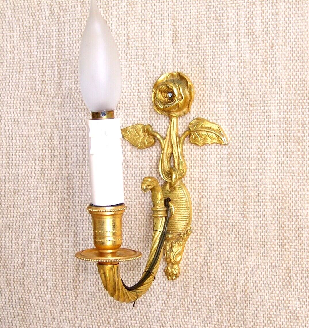 Simple wall sconce in classic Empire style made of vintage French cast brass 4316.