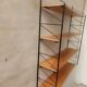 String style wall shelf