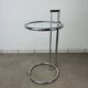 Chrome and glass design side table, adjustable.
