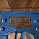 Vintage industrial workbench table with cast iron legs (Aux Forges de Vulcain)