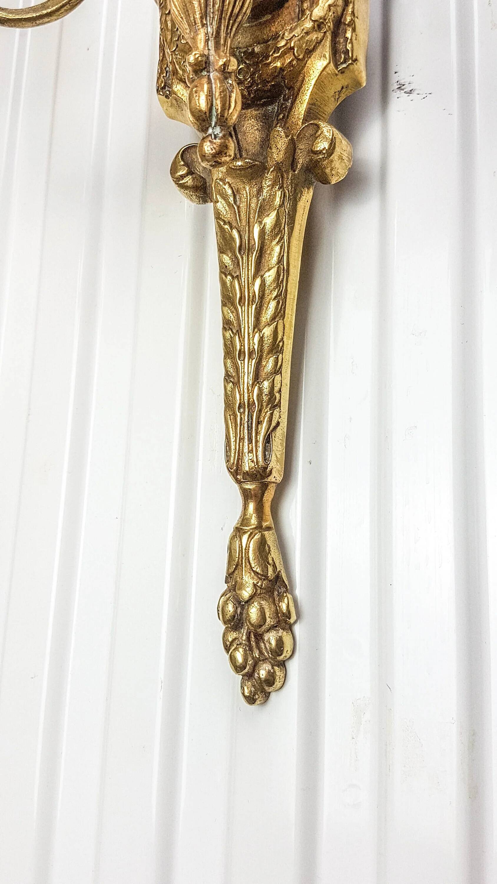 Bronze wall sconce in Empire style