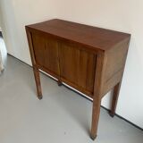 Old wooden cabinet with extendable doors