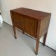 Old wooden cabinet with extendable doors