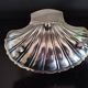 Butter dish, small bowl or shell-shaped trinket dish in silver-plated metal.