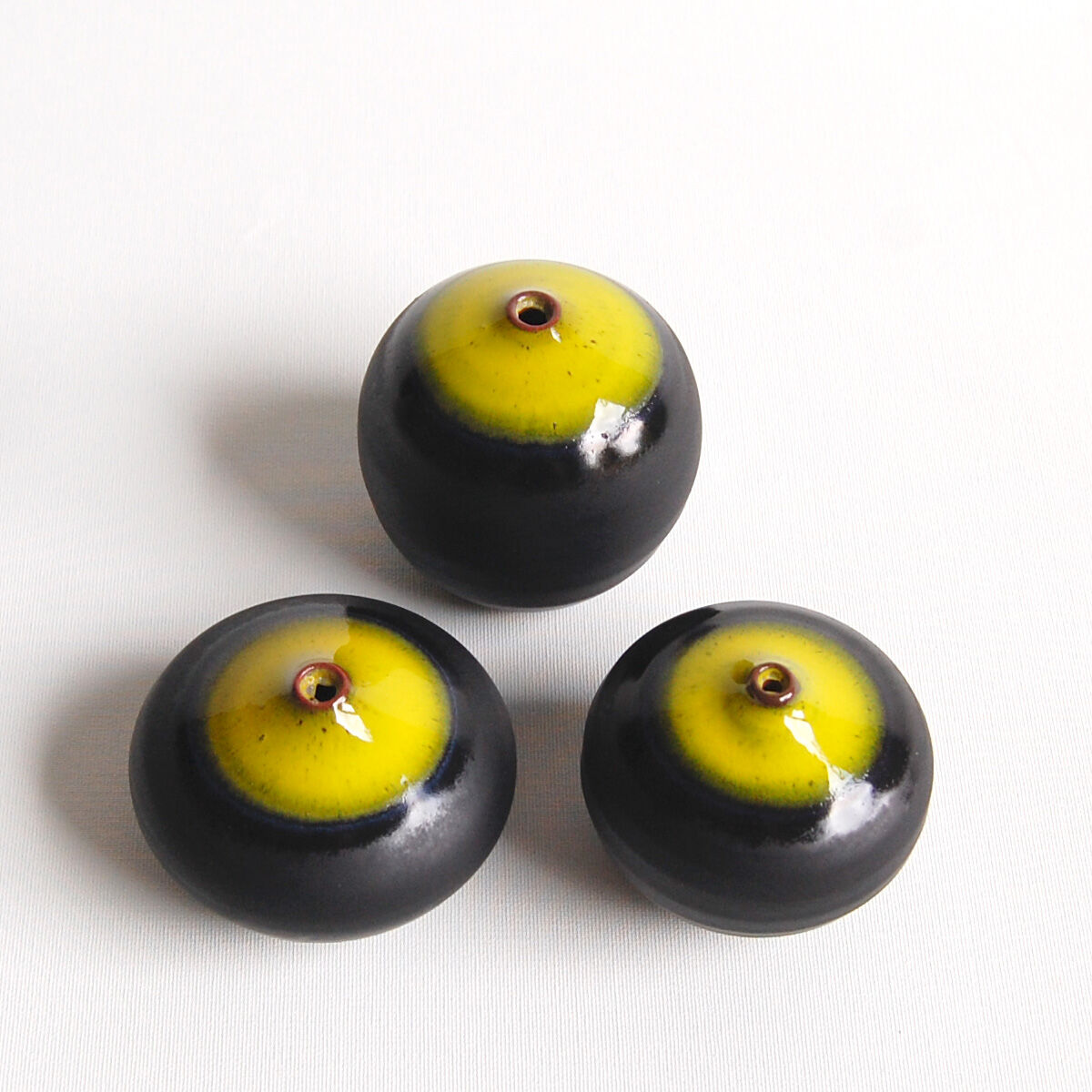 Trio of black and yellow miniature ceramics Antonio Lampecco