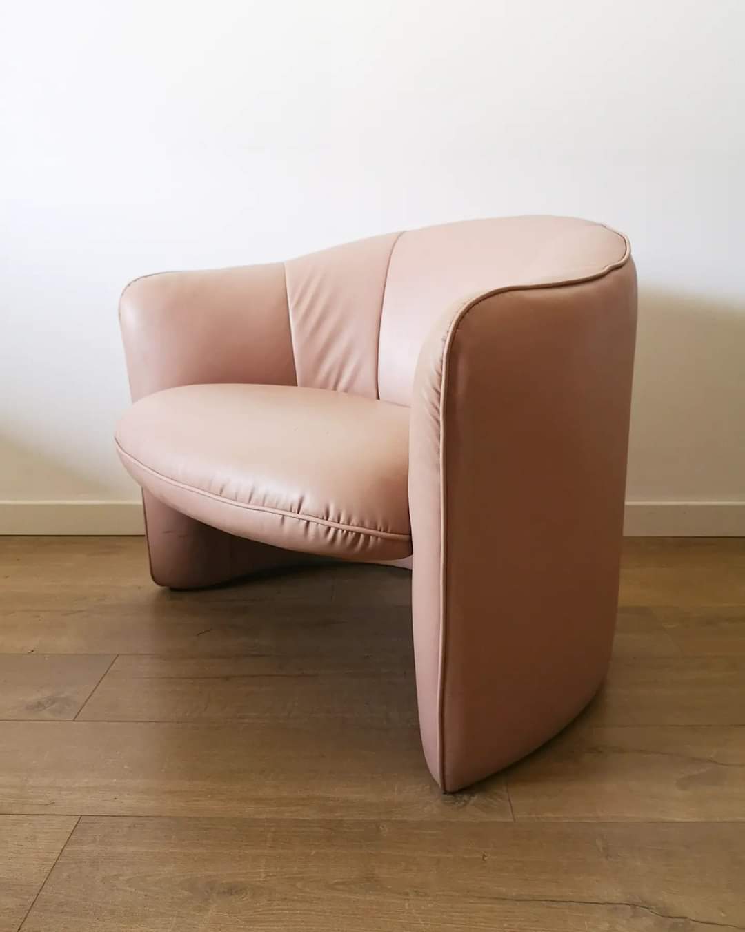 Pair of pink skai armchairs