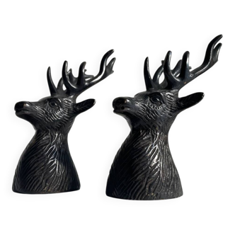 Salt and pepper shaker set with patinated brass deer heads.